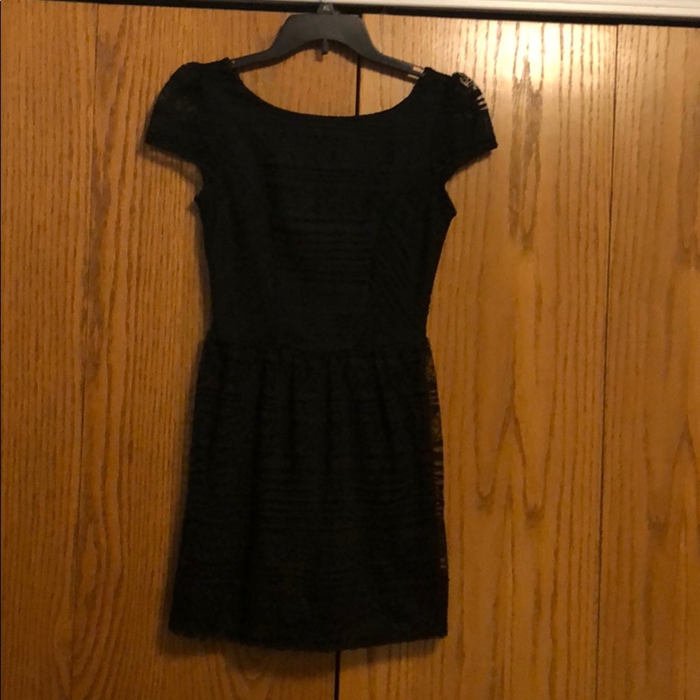 Black lace cocktail dress.